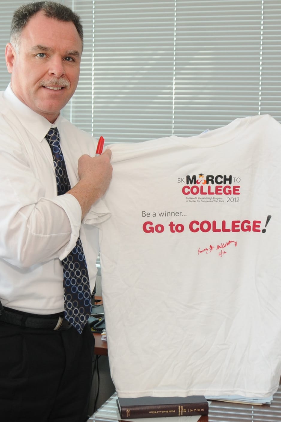 Supt_McCarthy_holding_cropped-002
